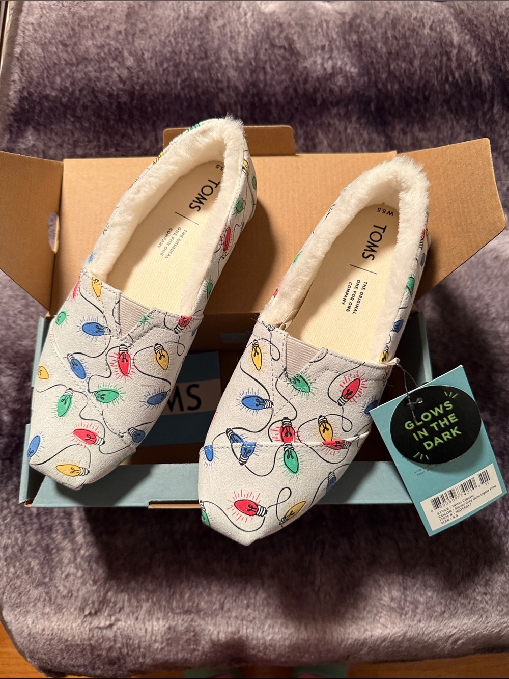 TOMS White Slip-On Shoes with Multicolor Holiday Light Print. Fuzzy inside.
